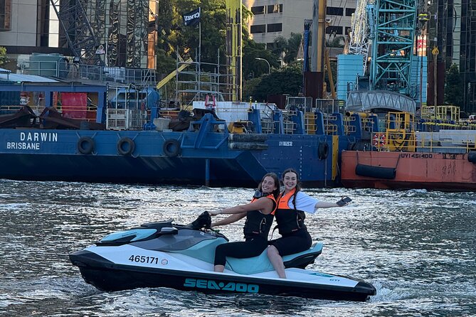 2 Hour Brisbane River Jetski Adventure - South Bank by water: Streets Beach, park space, and city life close-up